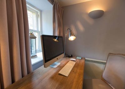 Writing desk area with Apple Mac
